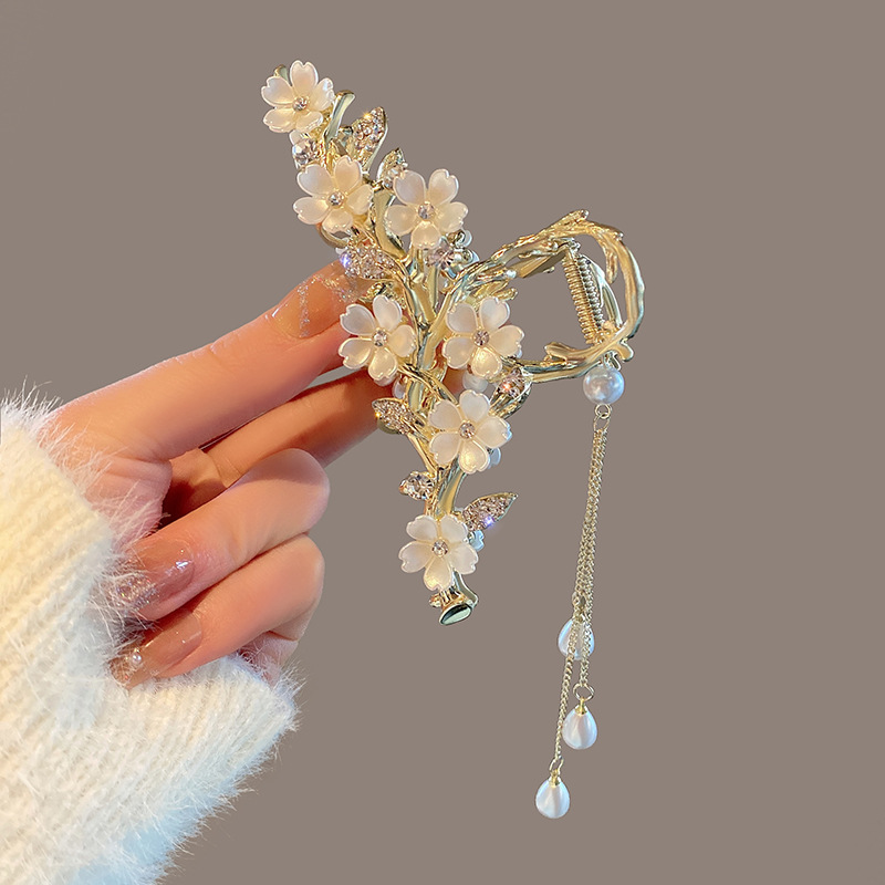 4d64fcc2-6a2c-44c2-b76d-5b66985b1648.jpg Large Metal Pearl Bell Orchid Tassel Hair Clip - Image 1