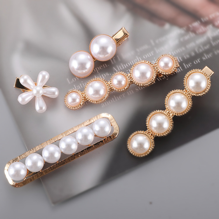 909298506786.jpg Slip-on Pearl Bow Hair Clip - Image 1